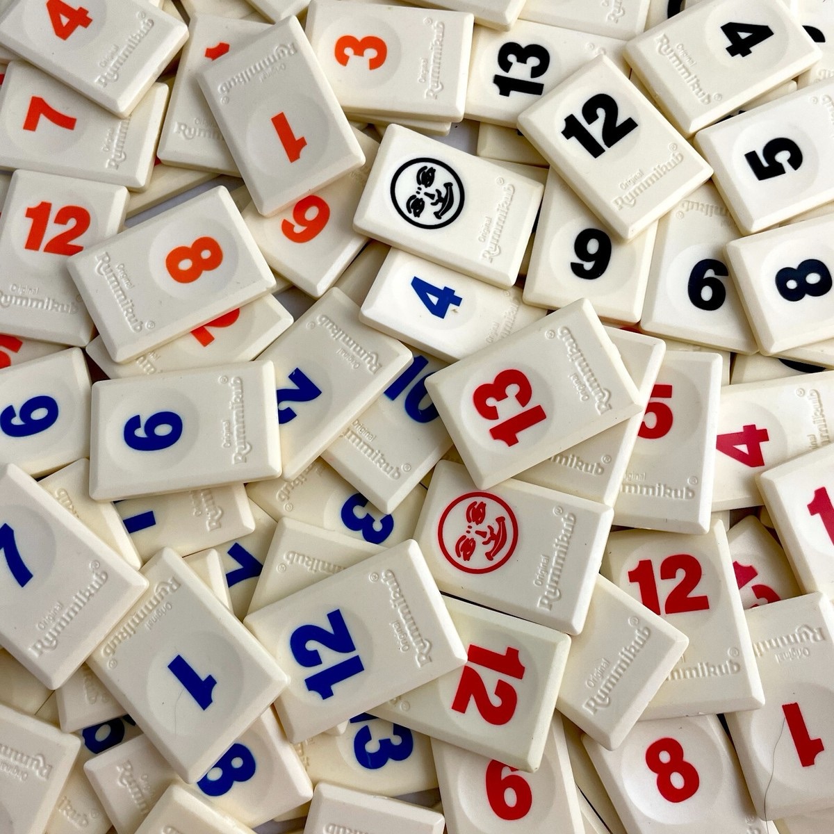 picking up Rummikub tiles